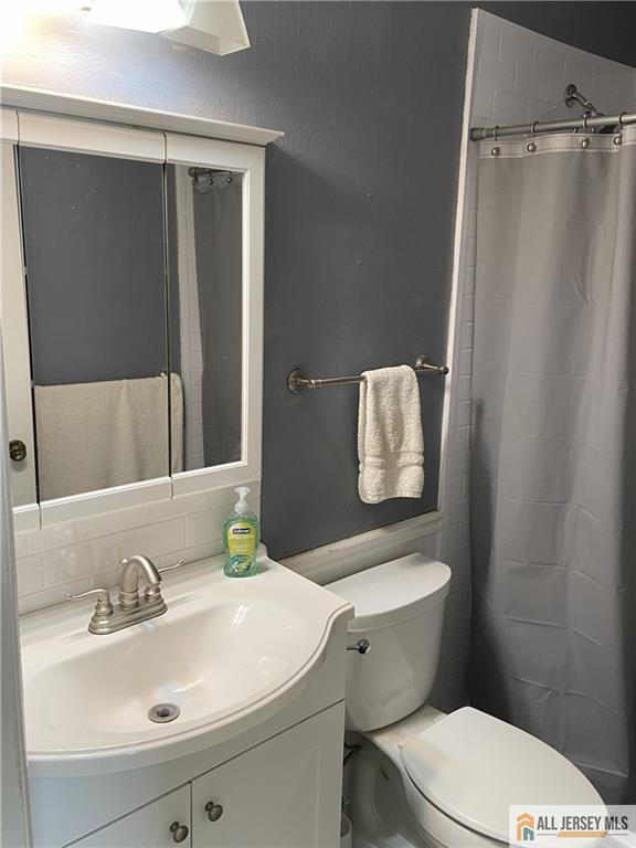 525 Belford Road, Unit O Monroe Township, NJ 08831 - Photo 13 of 19 a bathroom with a sink toilet and shower