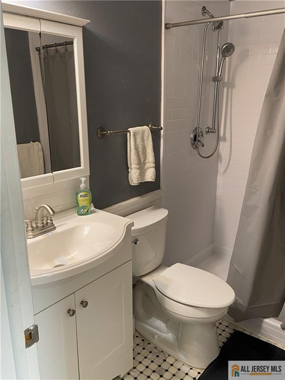 525 Belford Road, Unit O Monroe Township, NJ 08831 - Photo 14 of 19 a bathroom with a sink toilet and shower