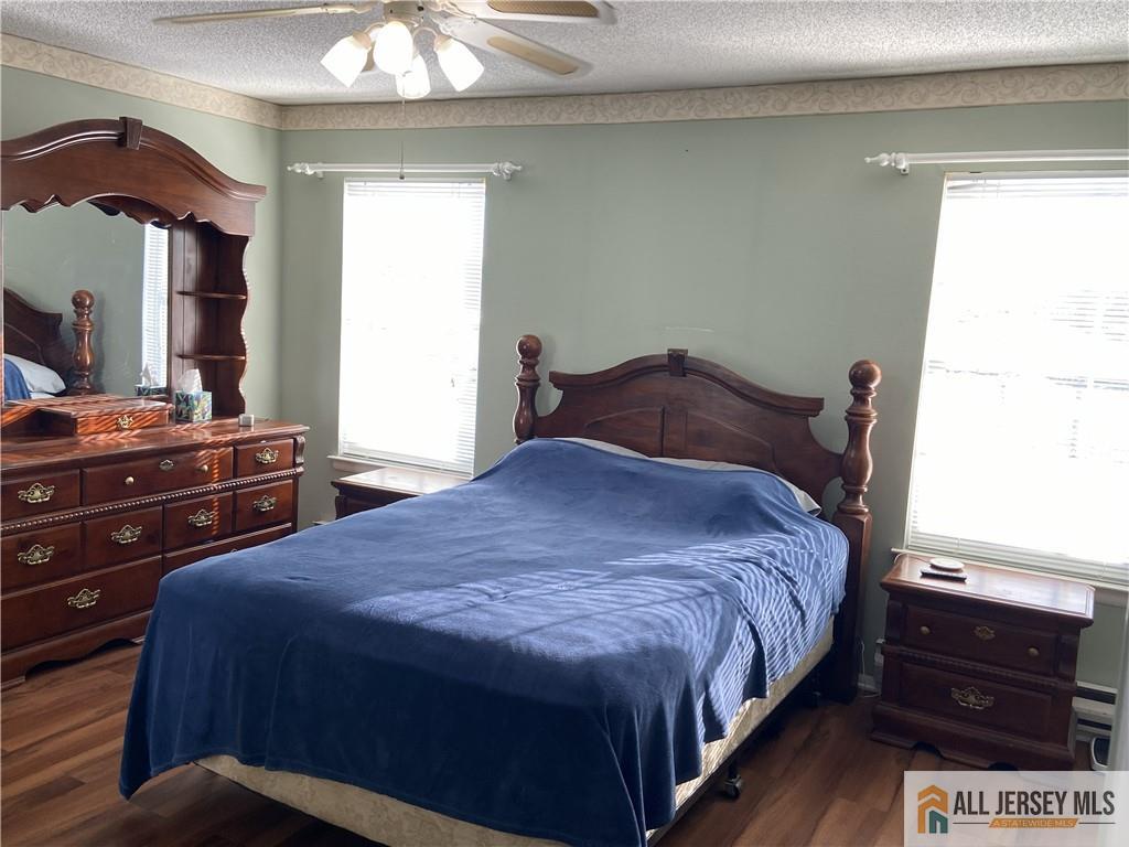 525 Belford Road, Unit O Monroe Township, NJ 08831 - Photo 10 of 19 a bedroom with bed and window