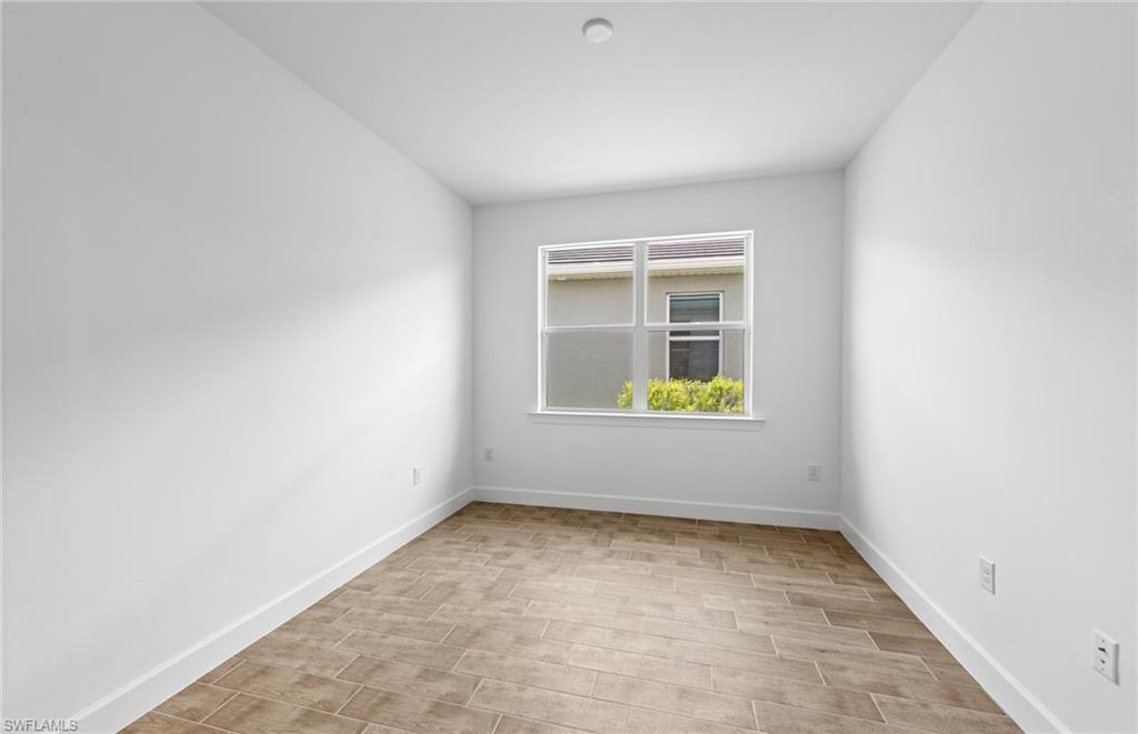 12464 Basalt Lane Alva, FL 33920 - Photo 17 of 28 an empty room with window