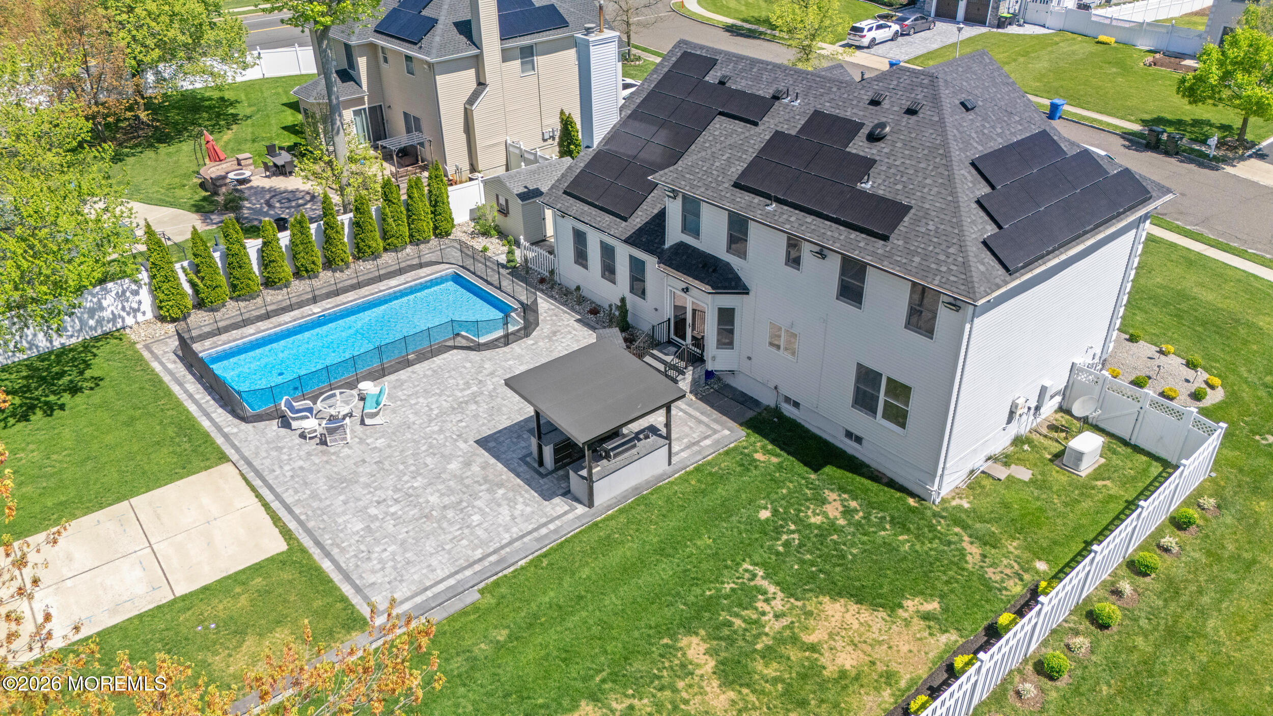 104 Autumn Road Matawan, NJ 07747 - Photo 50 of 64 an aerial view of a house with a garden and deck