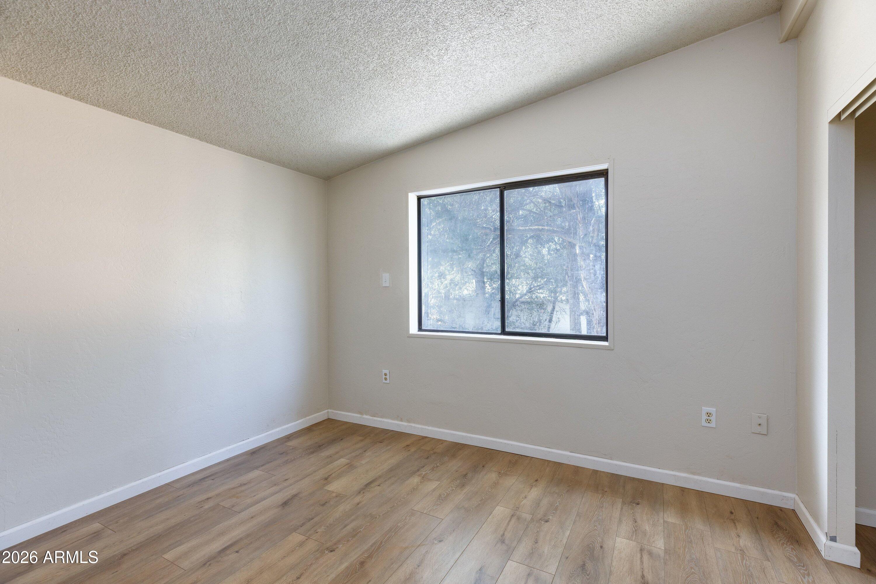 1302 North Matterhorn Road Payson, AZ 85541 - Photo 15 of 27 an empty room with a window