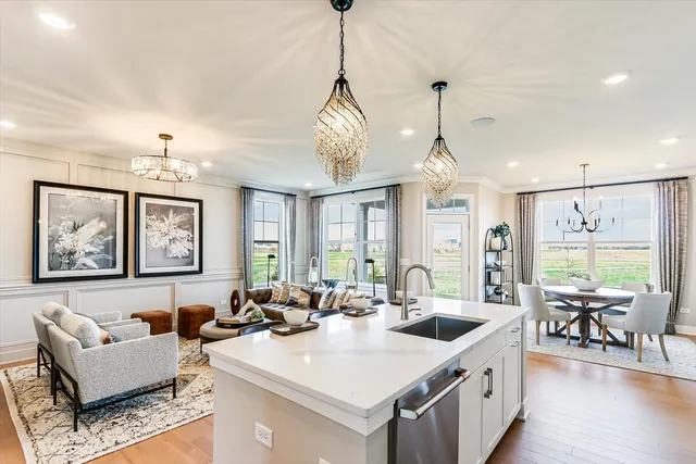 a very nice looking living room with a large window