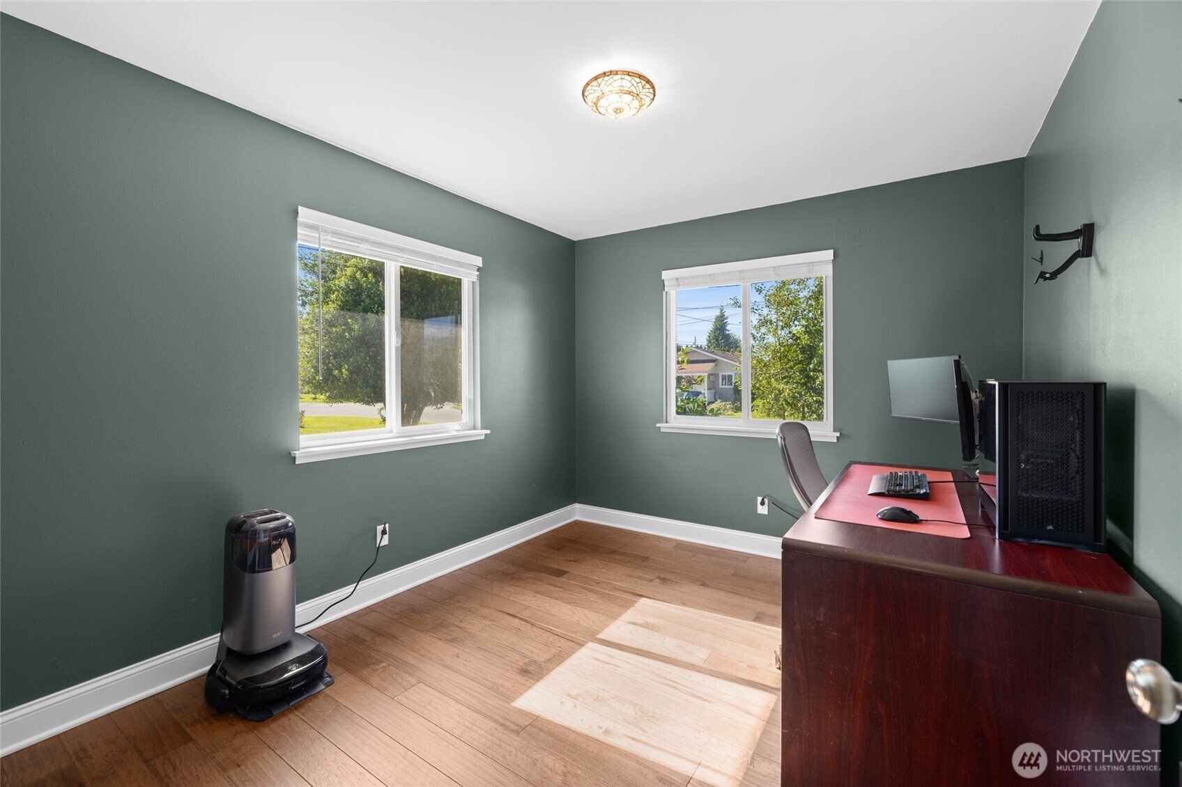 415 Sterling Street Sedro-Woolley, WA 98284 - Photo 11 of 38 a bedroom with a bed and a window
