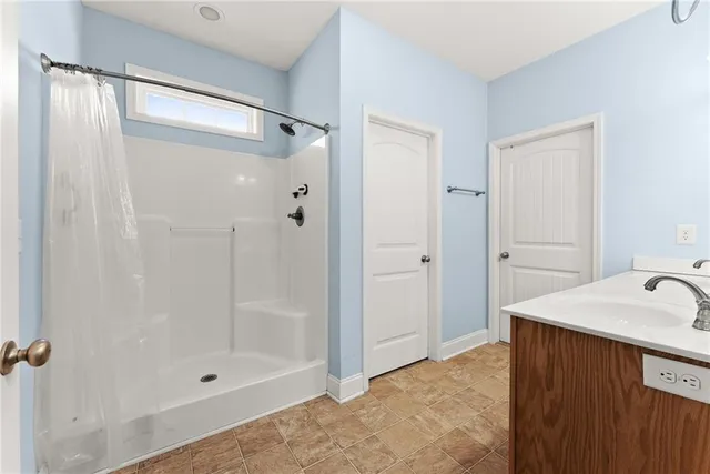 a view of a room with glass door