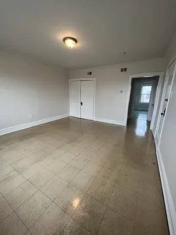 an empty room with a natural light