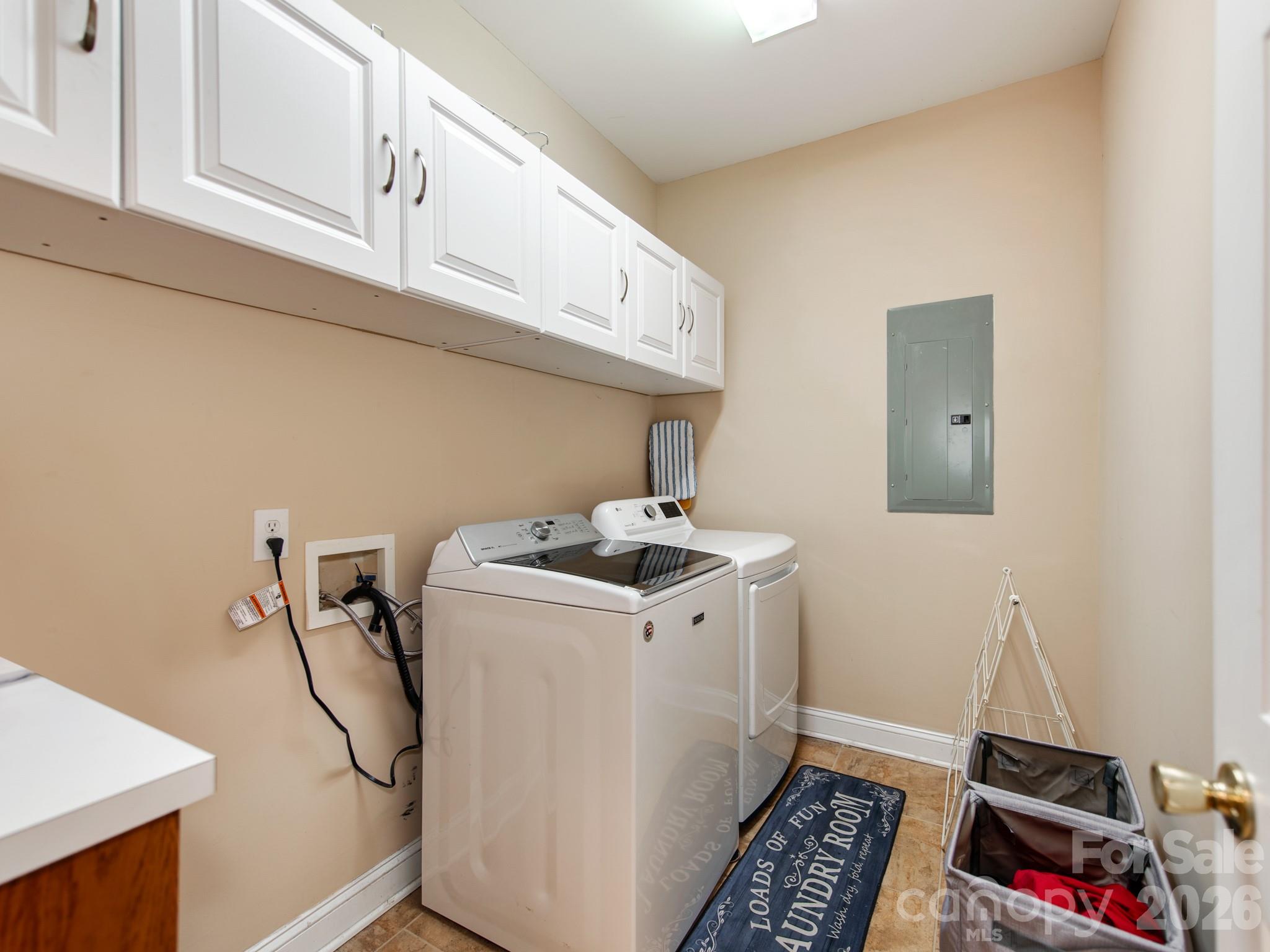 2261 Stallings Road Harrisburg, NC 28075 - Photo 37 of 41 a utility room with dryer and washer