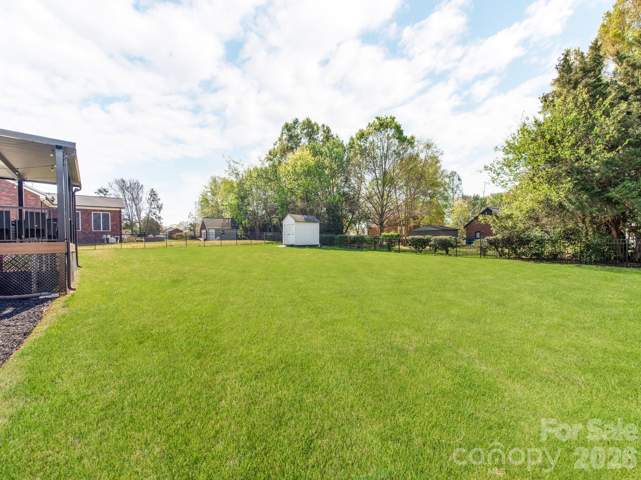 2261 Stallings Road Harrisburg, NC 28075 - Photo 40 of 41 a view of a garden with a house
