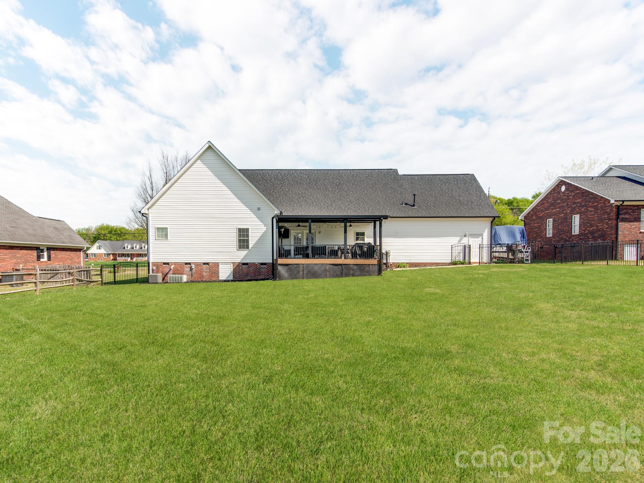 2261 Stallings Road Harrisburg, NC 28075 - Photo 41 of 41 a view of house with backyard