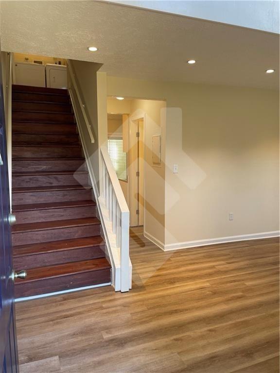 4267 Grogan Street Acworth, GA 30101 - Photo 3 of 37 a view of entryway and hall with wooden floor
