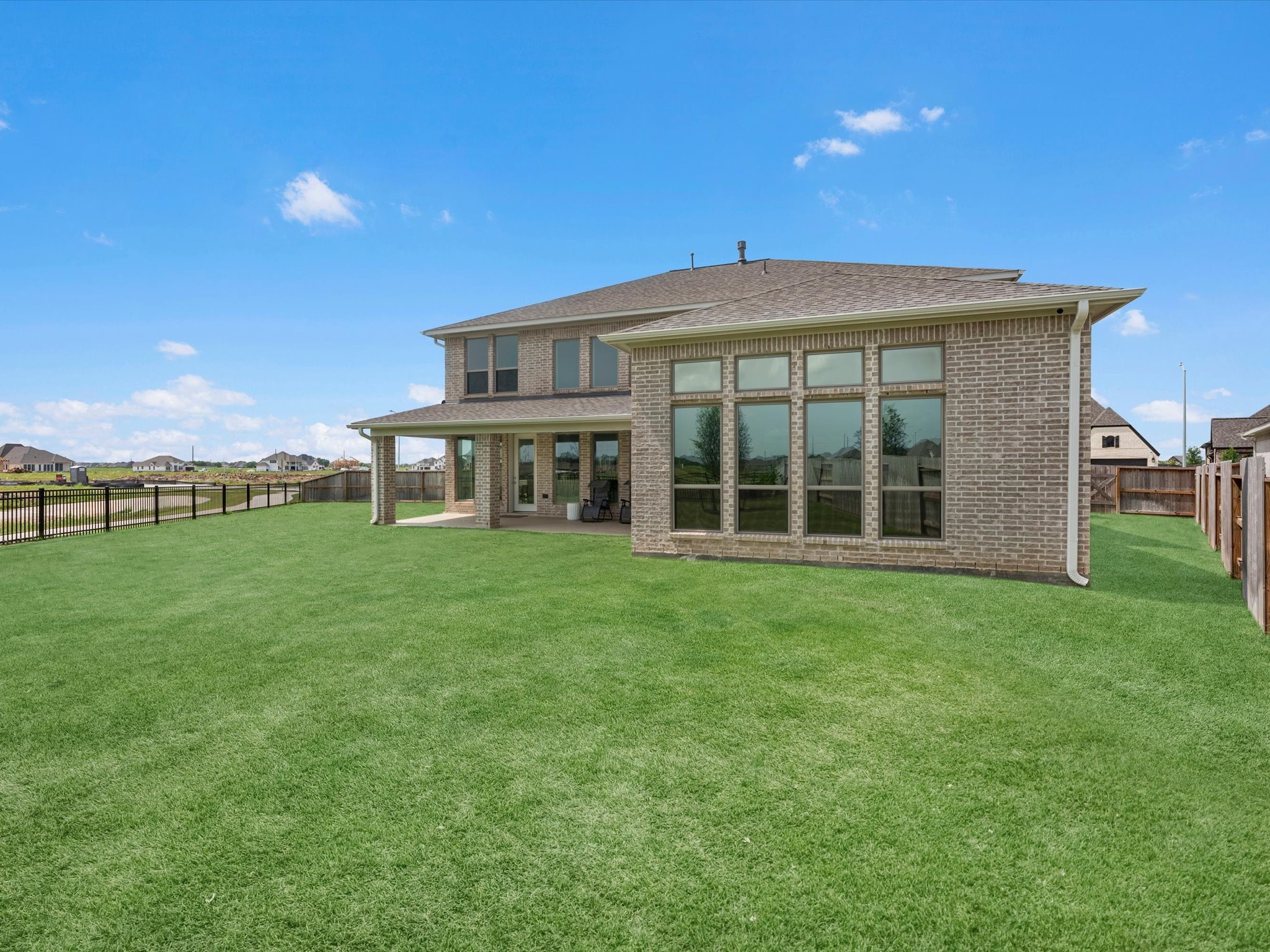 18714 Pistachio Way Manvel, TX 77578 - Photo 42 of 48 With no current rear neighbors and an abundance of usable green space, this backyard offers the flexibility to create the outdoor lifestyle you've been dreaming of while still leaving plenty of room to relax, play, and entertain.