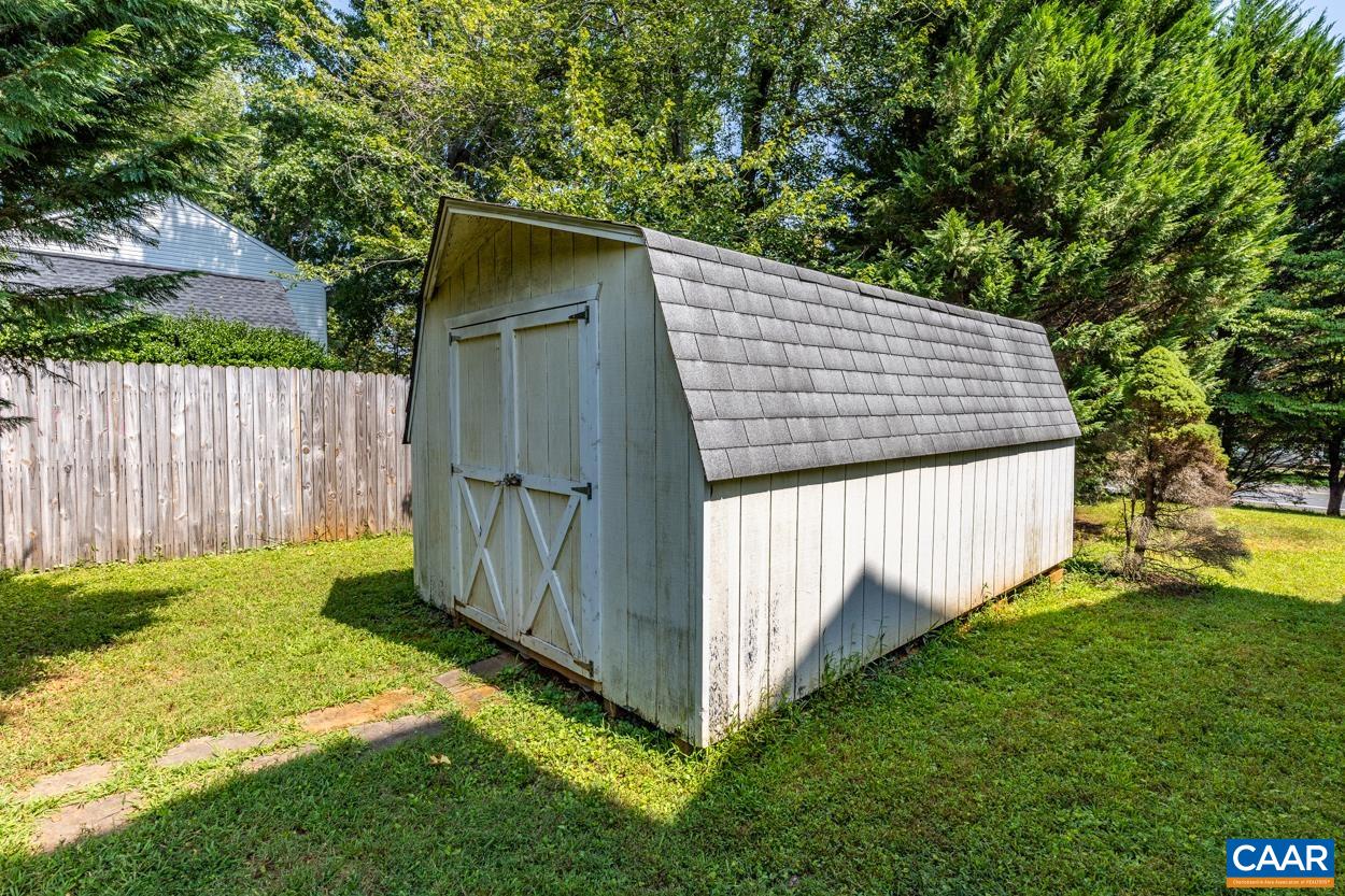 2705 Huntington Road Charlottesville, VA 22901 - Photo 25 of 27 a view of backyard with small cabin and wooden fence