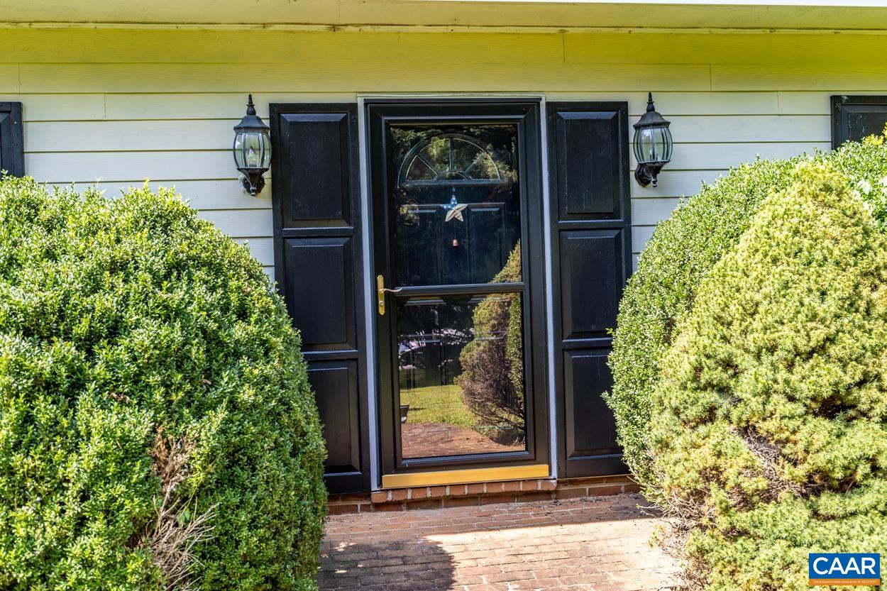 2705 Huntington Road Charlottesville, VA 22901 - Photo 3 of 27 a view of a door of the house and a street view