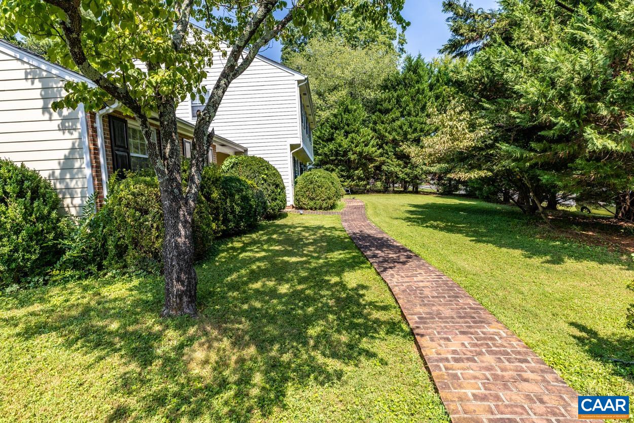 2705 Huntington Road Charlottesville, VA 22901 - Photo 4 of 27 a backyard of a house with lots of green space