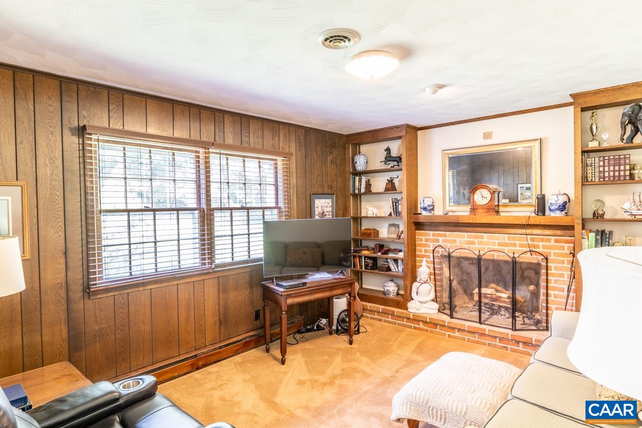 2705 Huntington Road Charlottesville, VA 22901 - Photo 10 of 27 a living room with furniture and a large window