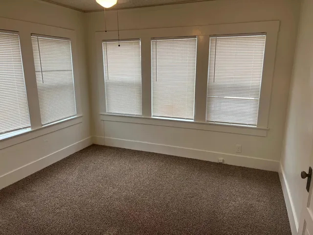 an empty room with a window