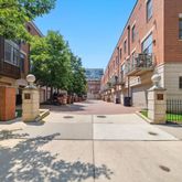a view of a building with a street