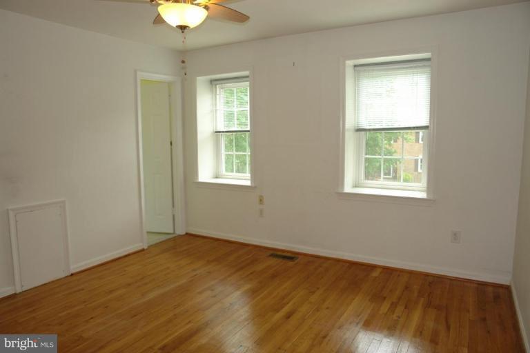 7014 Leestone Street Springfield, VA 22151 - Photo 14 of 23 a view of an empty room with a window
