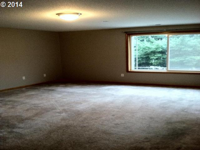 620 Southwest Trout Court Camas, WA 98607 - Photo 2 of 8 a view of an empty room with a window