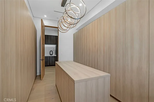 a bathroom with a double vanity sink mirror and bathtub