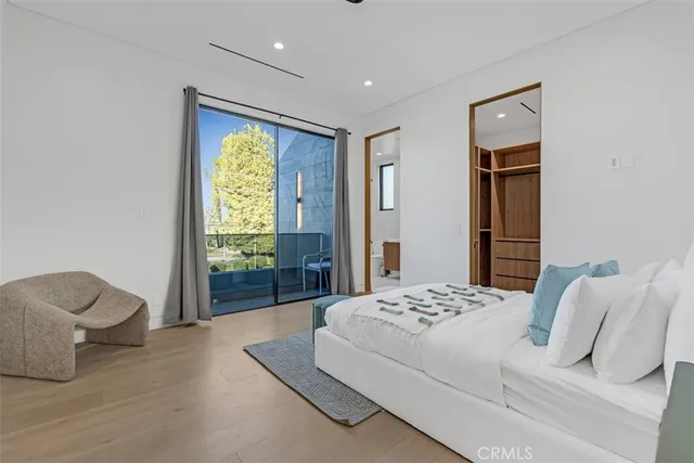 a utility room with sink dryer and washer