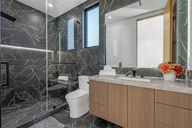 a view of swimming pool with seating area and furniture