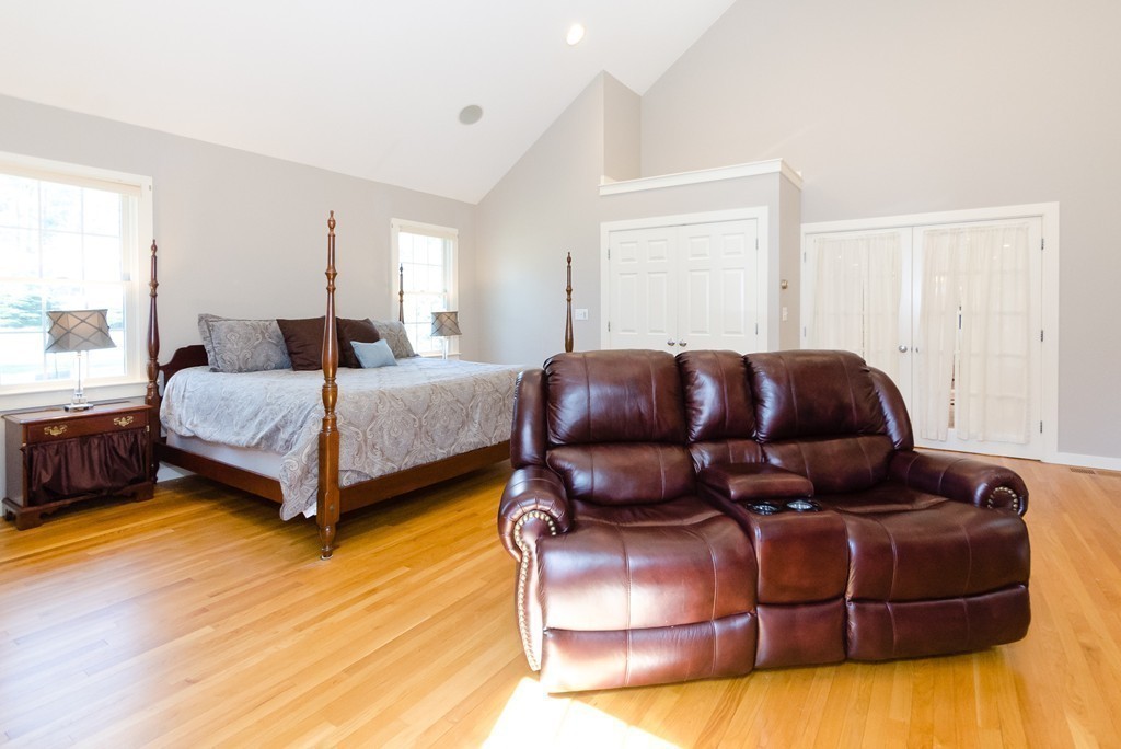7 Ridgewood Lane Marion, MA 02738 - Photo 11 of 24 a living room with a bed and furniture