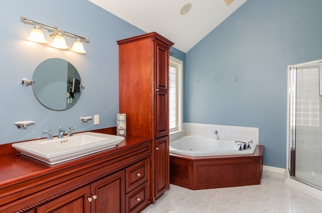7 Ridgewood Lane Marion, MA 02738 - Photo 12 of 24 a bathroom with a sink and a mirror