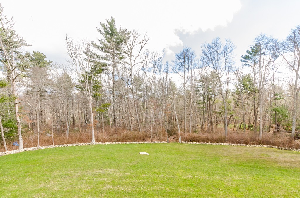 7 Ridgewood Lane Marion, MA 02738 - Photo 22 of 24 a view of a field with trees in the background