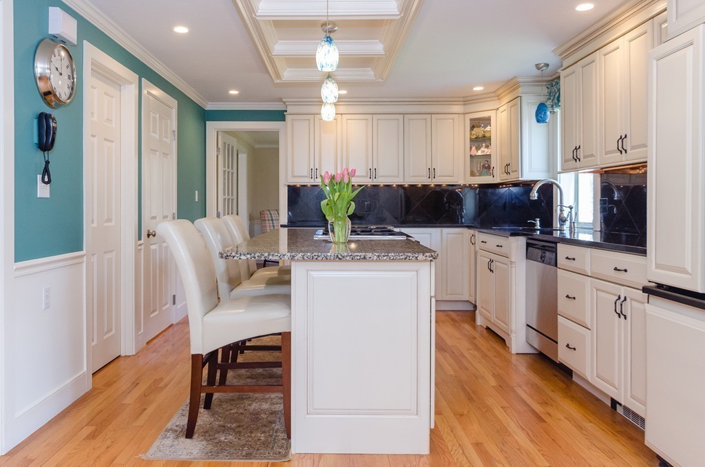 7 Ridgewood Lane Marion, MA 02738 - Photo 5 of 24 a kitchen with white cabinets and sink