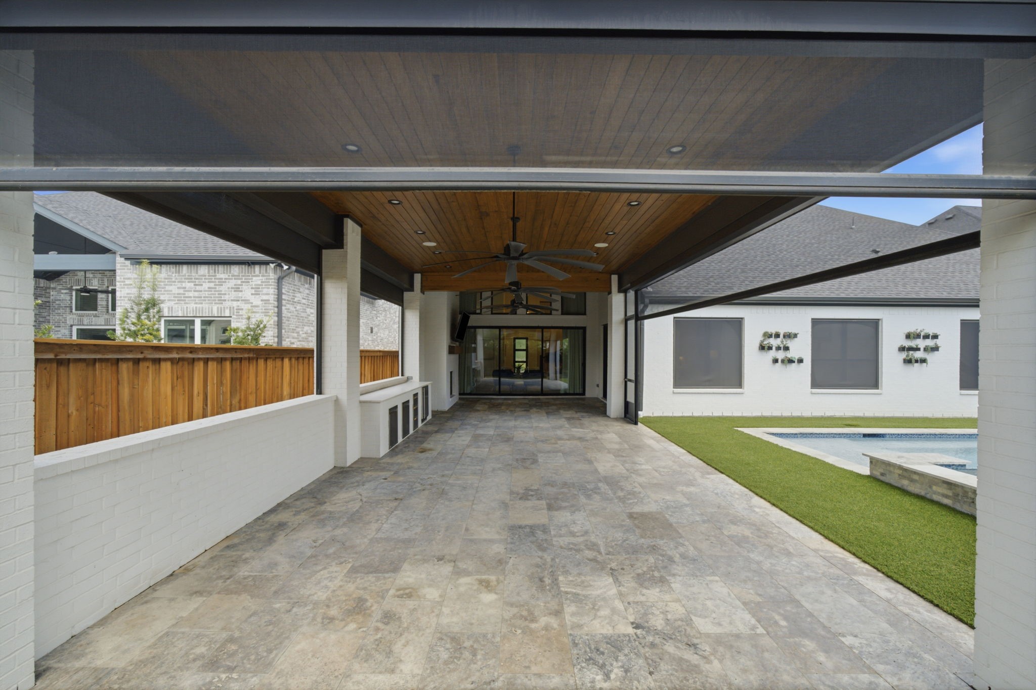 4712 Lorelai Lane Spring, TX 77386 - Photo 30 of 35 The patio features electronic roller shades