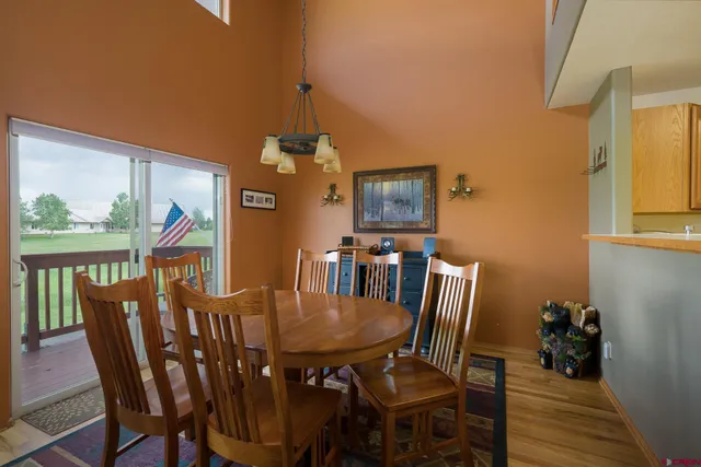 a view of a dining room with furniture