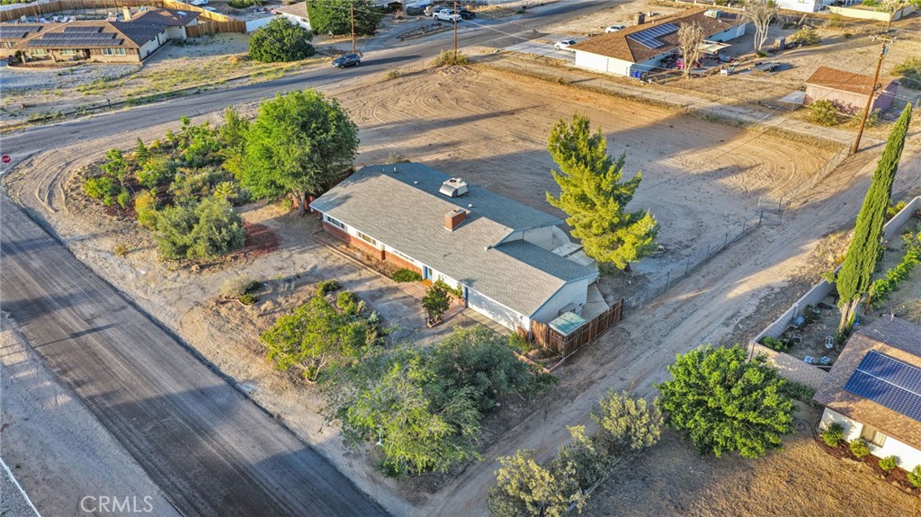 15177 Mendota Road North Apple Valley, CA 92307 - Photo 42 of 50 a view of a yard with chairs