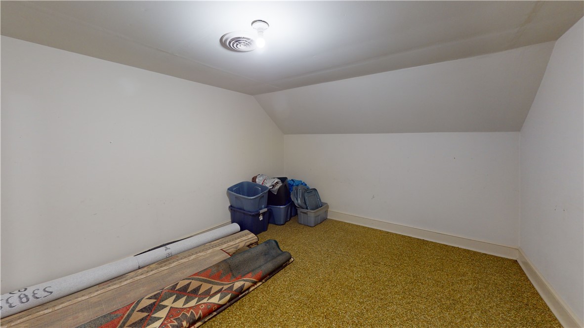 415 Church Street Pendleton, SC 29670 - Photo 34 of 35 Functional attic space offering ample storage with carpeted flooring and an overhead light.