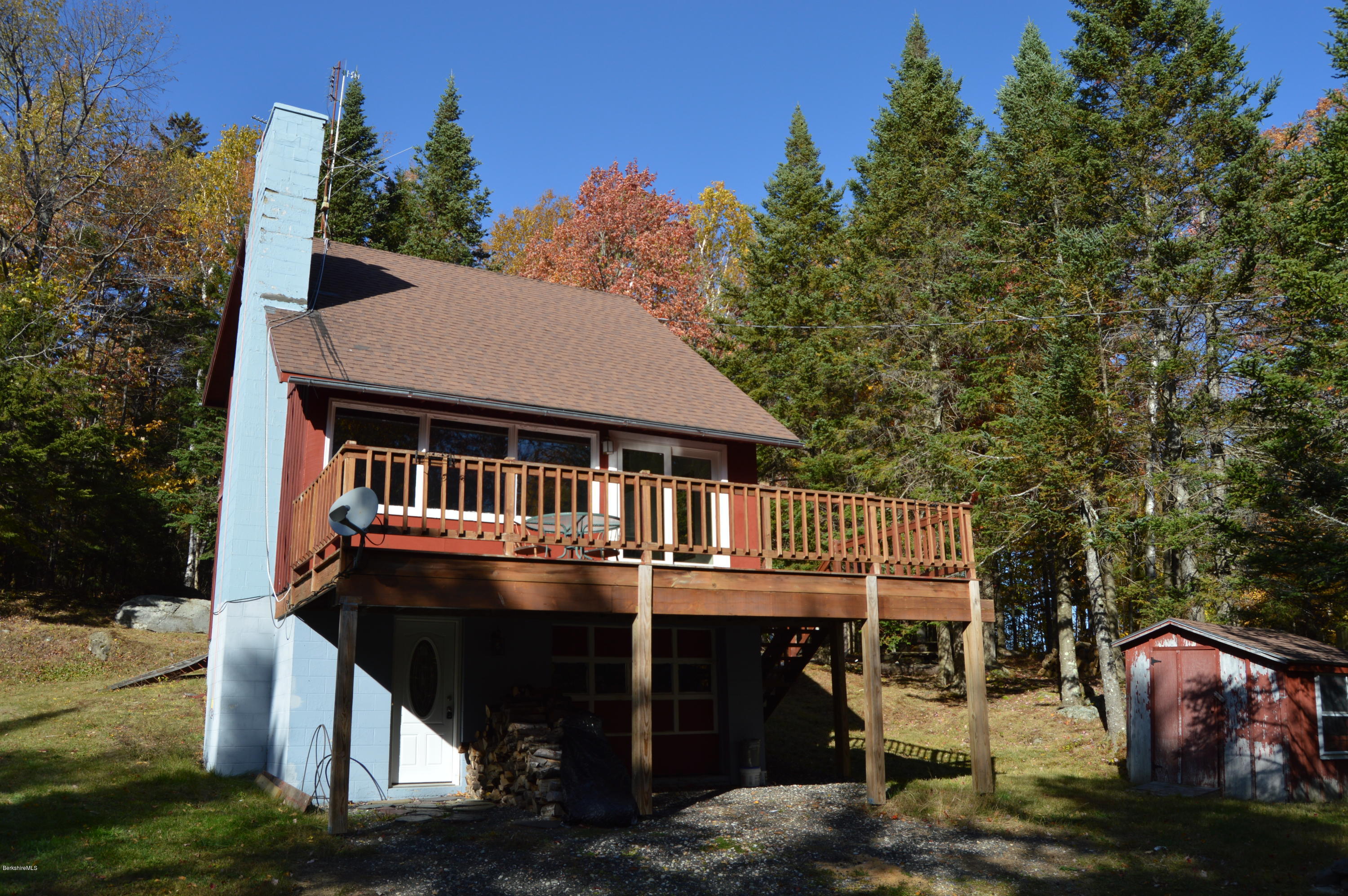 25 Davis Road Monroe, MA 01350 - Photo 3 of 27 a front view of a house with a balcony