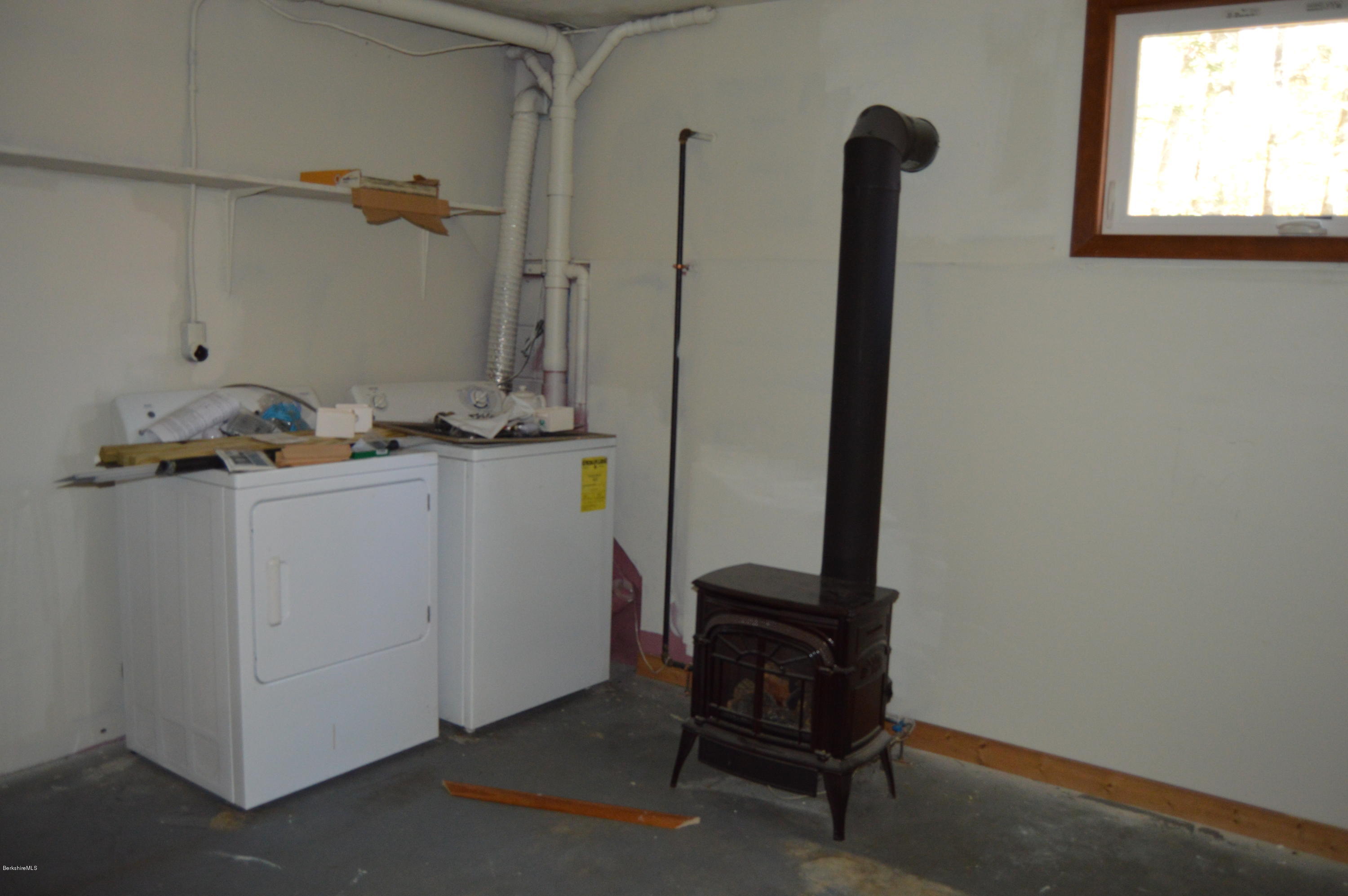 25 Davis Road Monroe, MA 01350 - Photo 24 of 27 a utility room with dryer and washer