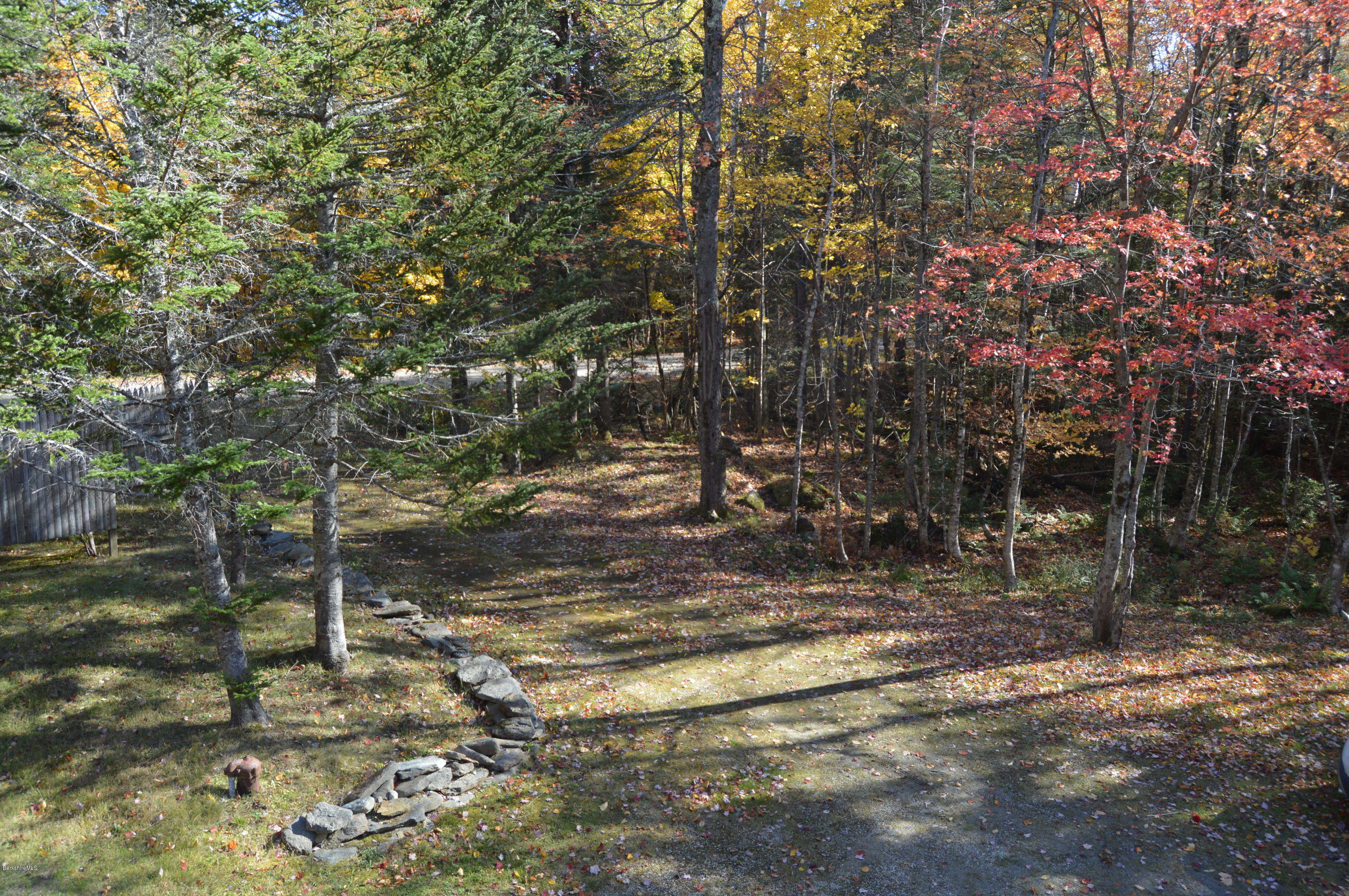 25 Davis Road Monroe, MA 01350 - Photo 26 of 27 a backyard of a house with lots of green space