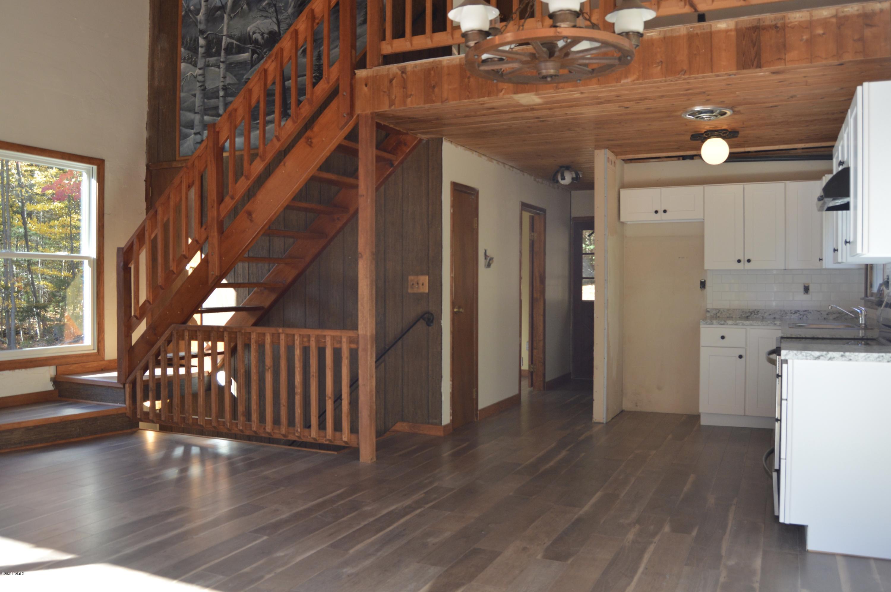 25 Davis Road Monroe, MA 01350 - Photo 9 of 27 a view of entryway and hall with wooden floor