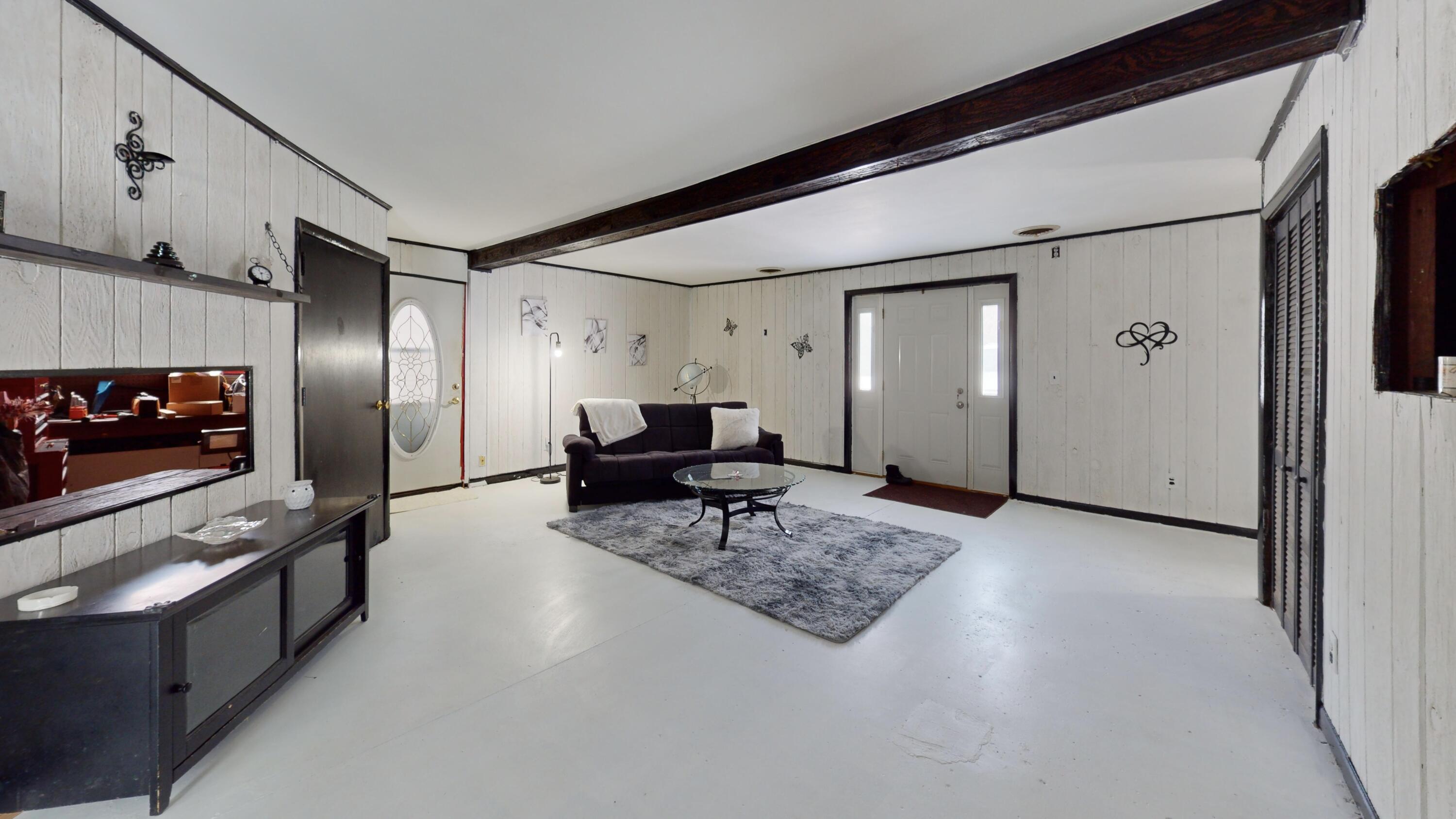 2240 South 350 East Knox, IN 46534 - Photo 13 of 103 a living room with furniture and a flat screen tv