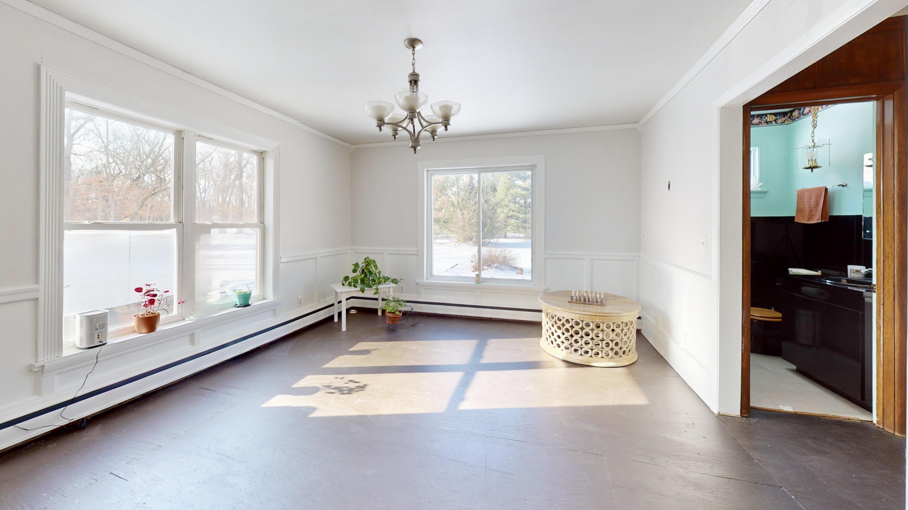 2240 South 350 East Knox, IN 46534 - Photo 22 of 103 a room with gym equipment and a large window