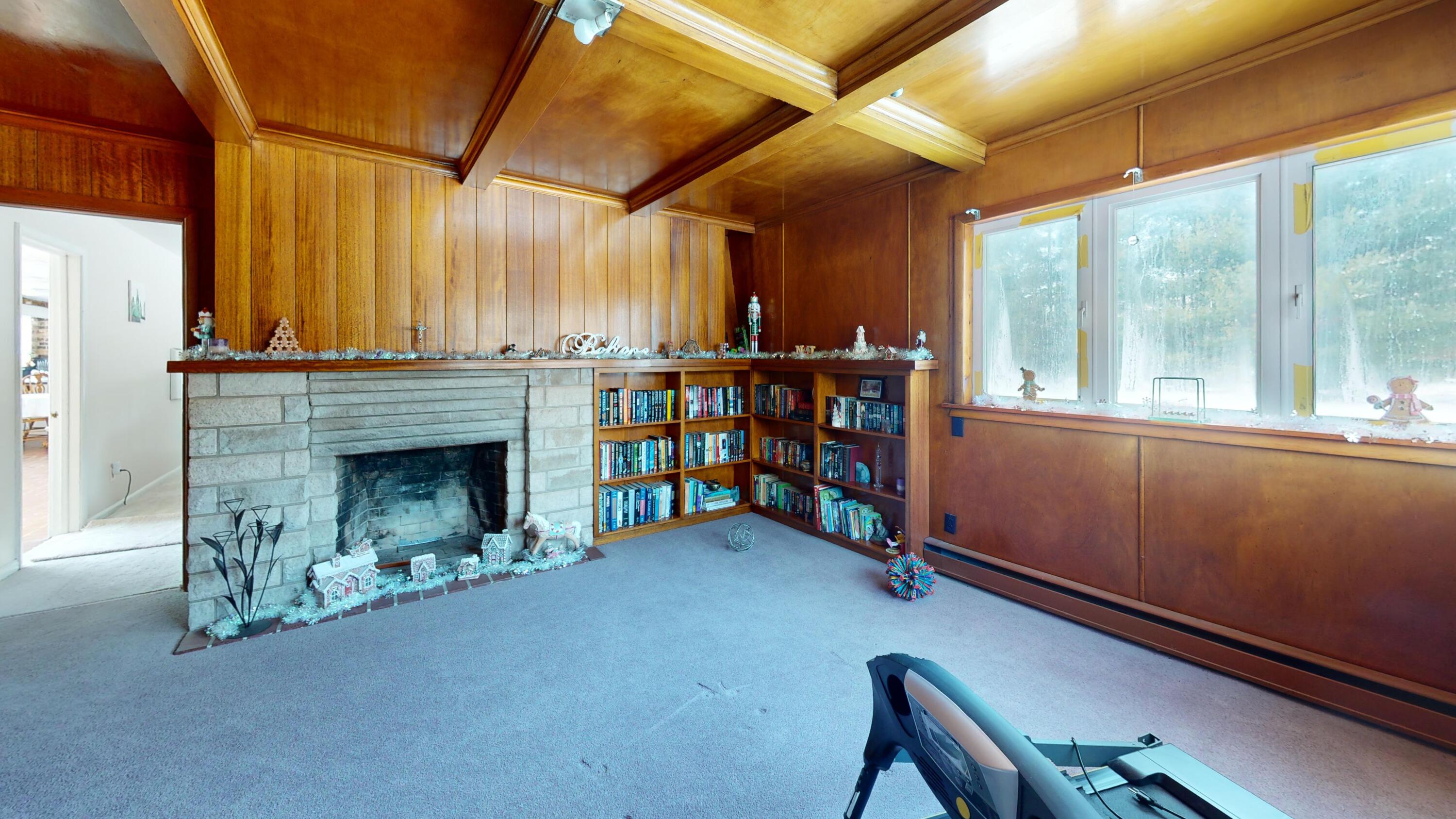 2240 South 350 East Knox, IN 46534 - Photo 38 of 103 a view of an empty room with a fireplace and a window