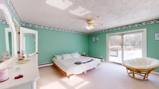 a view of house and a street