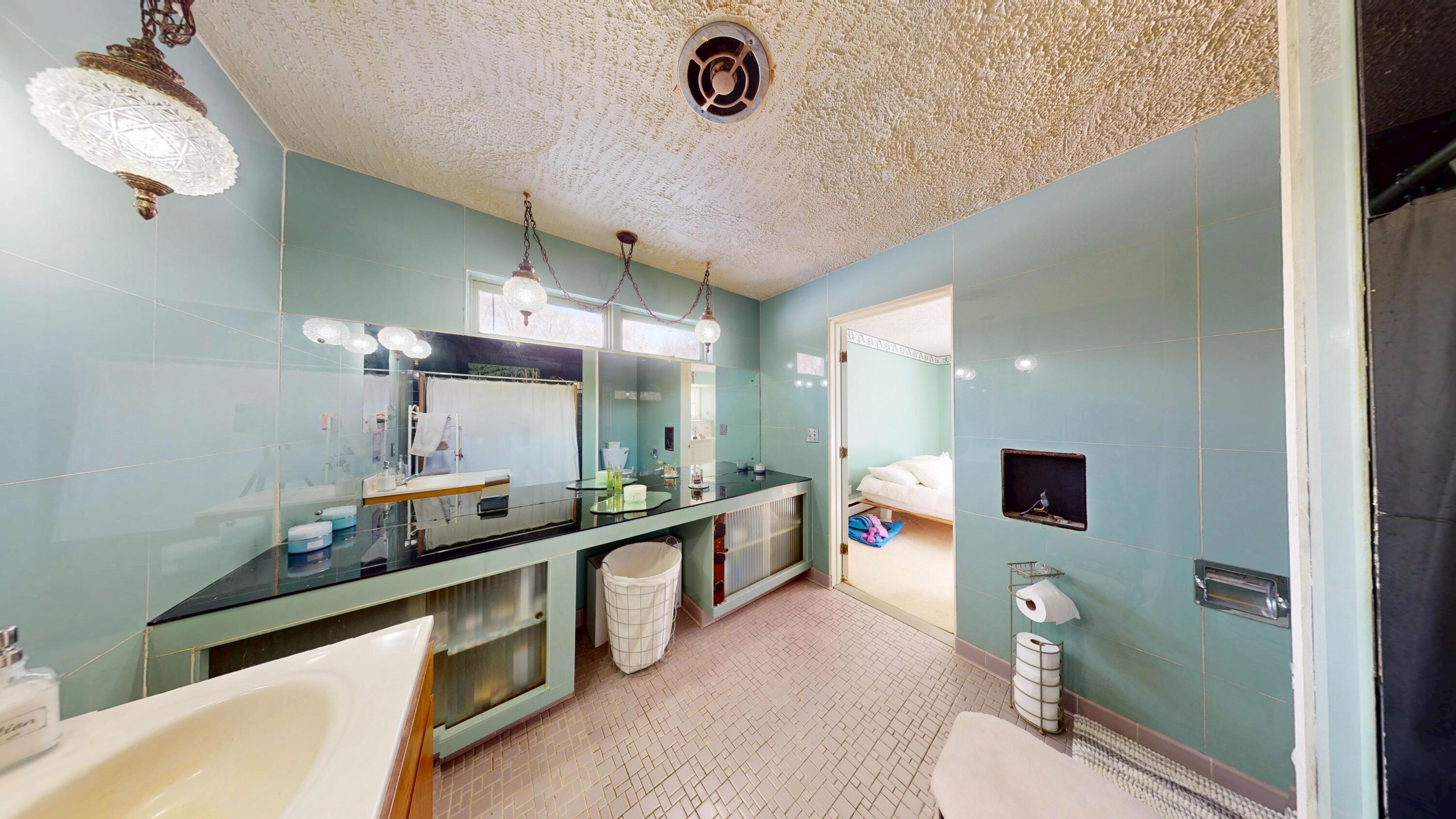 2240 South 350 East Knox, IN 46534 - Photo 46 of 103 a bathroom with a granite countertop sink mirror vanity and toilet