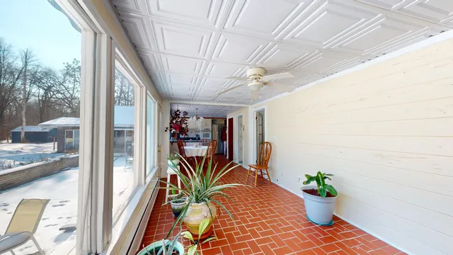 a view of swimming pool with outdoor seating