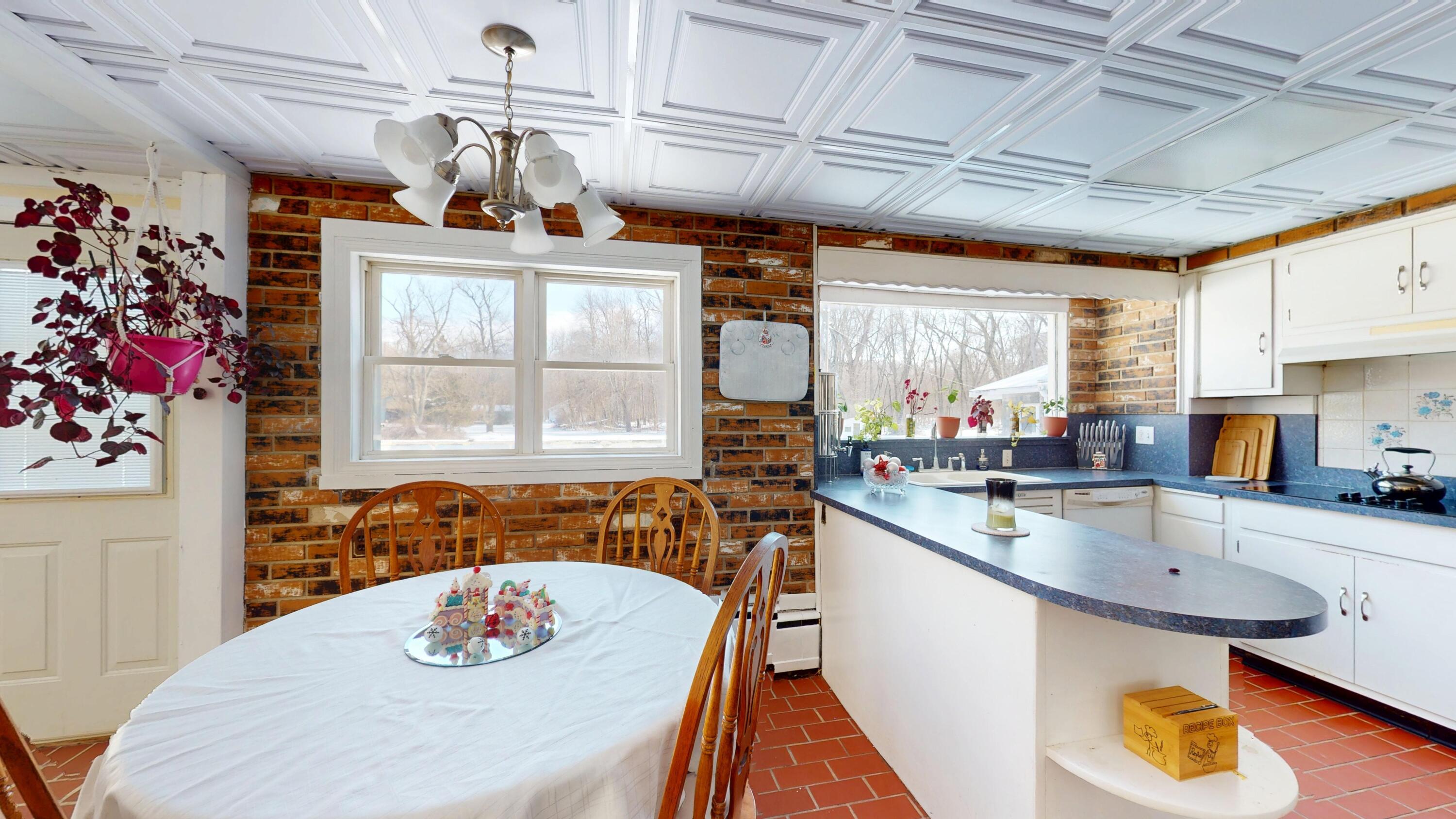 2240 South 350 East Knox, IN 46534 - Photo 56 of 103 a kitchen with stainless steel appliances granite countertop a sink window and cabinets