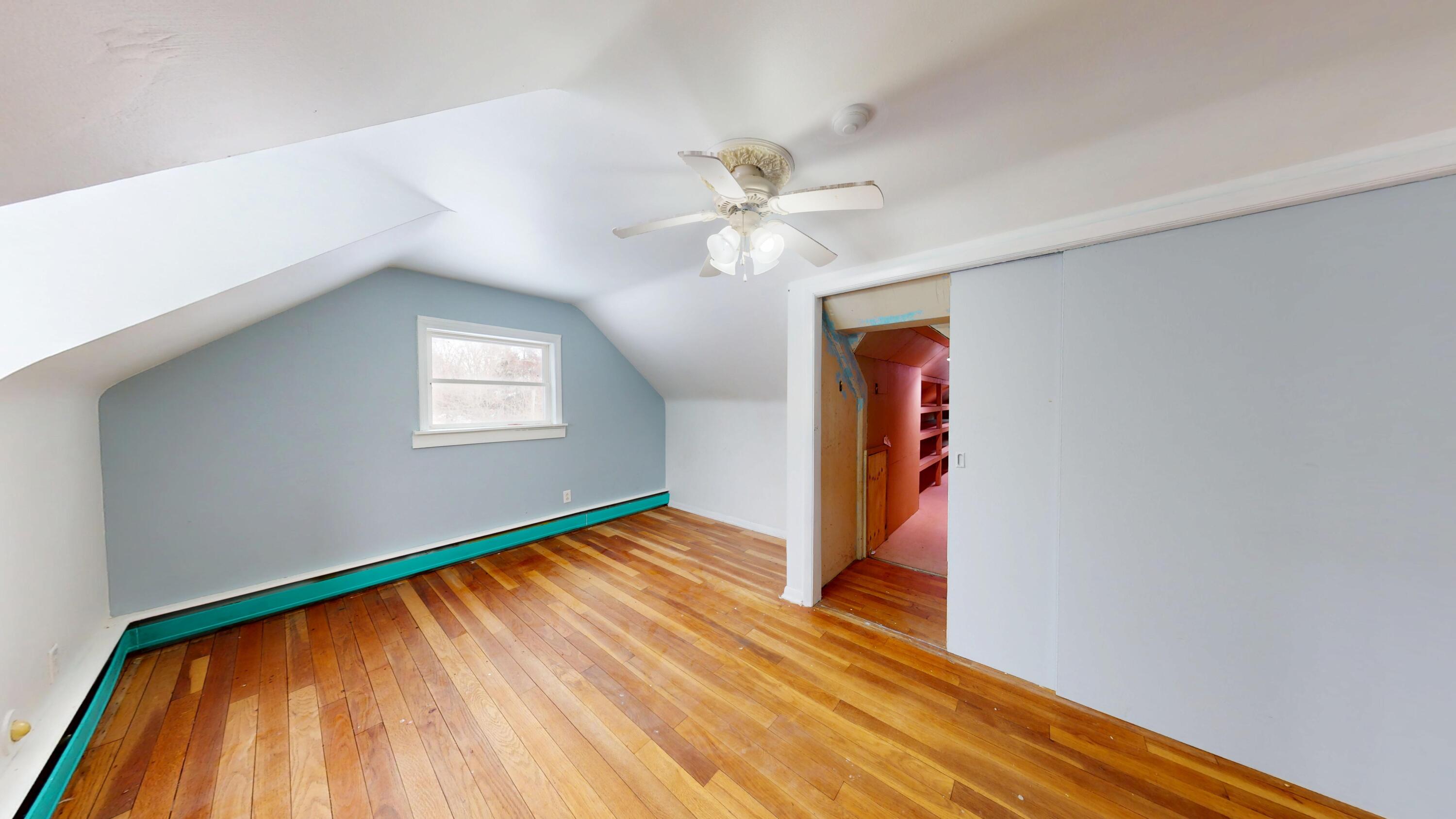 2240 South 350 East Knox, IN 46534 - Photo 79 of 103 a view of an empty room with window and wooden floor
