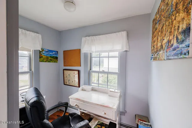 a room with furniture and a window