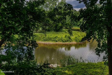 a view of a lake with a house