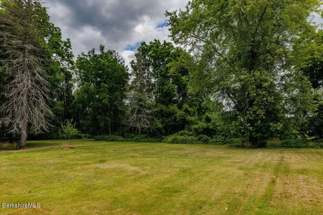 a view of a swimming pool and an outdoor space