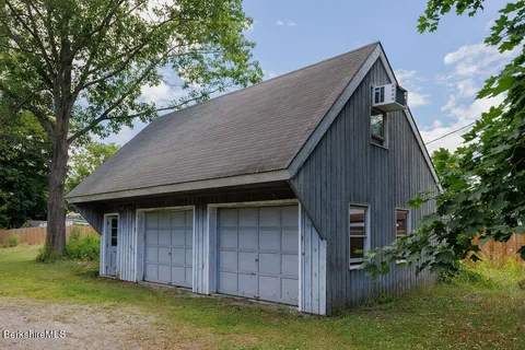 a house view with a backyard space